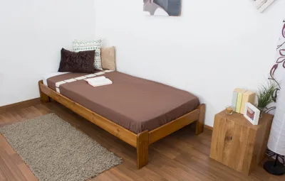 Produktbild von Massivholz-Einzelbett aus Kiefer, Eichefarben, 90x200 cm, mit Lattenrost