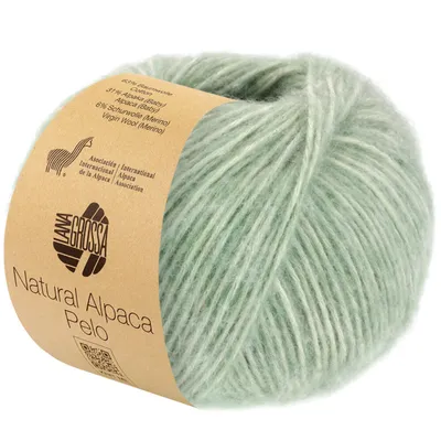 A ball of yarn with a paper label wrapped around it.