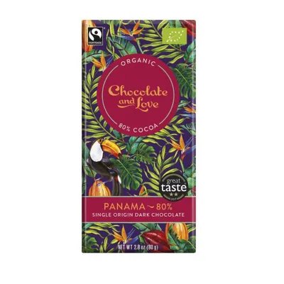 A bar of dark chocolate with a tropical design and text labels.