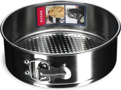 A round metal cake pan with a removable side and a textured bottom, shown on a white background. There are inset images on a label on the side of the pan.