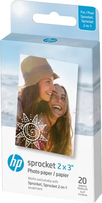 A box of HP Sprocket photo paper with a picture of two smiling women on the front.