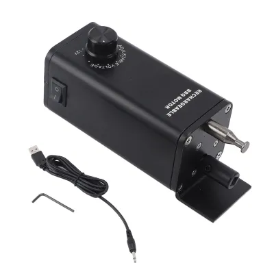 A black electric BBQ motor with accessories on a white background.