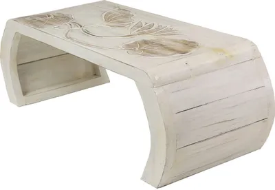 A white wooden side table with carved floral patterns on top, set against a white background.