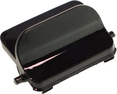 Close-up studio shot of a black plastic part.