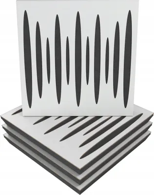 A stack of white acoustic wall panels with black cutouts, with one panel on top showing a different pattern.