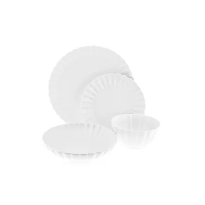 A set of white porcelain dishes arranged on a white background.