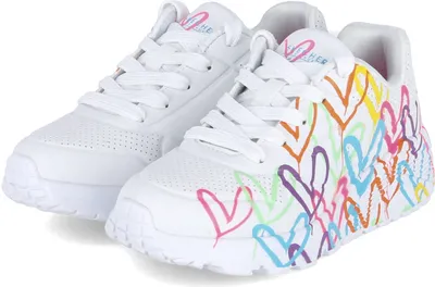 A pair of white Skechers sneakers with colorful heart designs.