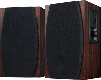 Two wooden speakers with black fabric fronts are shown side-by-side against a white background.
