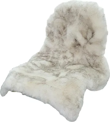 A fluffy, beige and gray faux fur rug is shown against a white background.