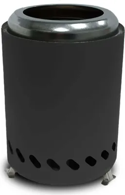 A black cylindrical table fire pit with a silver rim and ventilation holes at the base, resting on small metal legs.