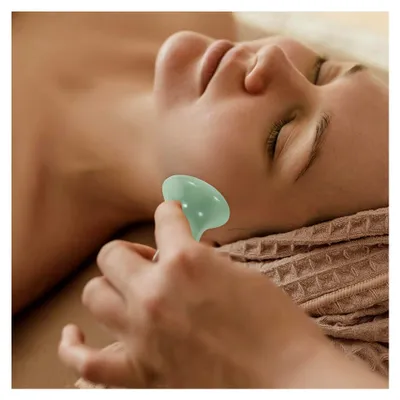 Produktbild von Massagestein in Pilzform für Gesichtsmassagen mit Schabefunktion zur Förderung der Durchblutung und Schmerzlinderung