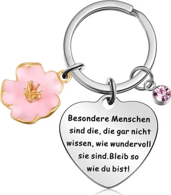 Image de Porte-clés inspiré avec un pendentif en diamant rose et une fleur