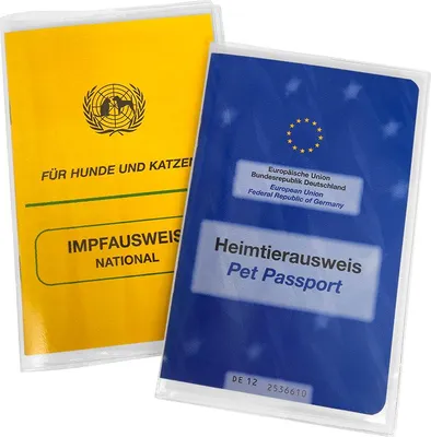 Two pet passports are shown, one yellow and one blue, in protective plastic sleeves.