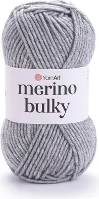 A ball of grey yarn with a label.