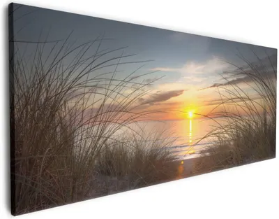Produktbild von Wallario Premium Leinwandbild Sonnenuntergang am Strand in Größe 60 x 150 cm