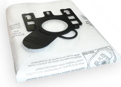 A close-up of a white vacuum cleaner bag with a black plastic adapter attached.