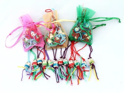 Produktbild von 07, Glückspüppchen 12 er Set, Holzpuppe Mini im Organzabeutel