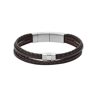 A close-up studio shot of a brown braided leather bracelet with silver clasps against a white background.