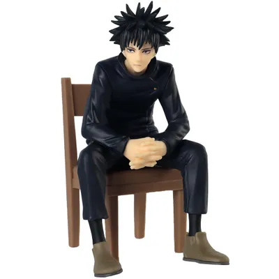 A figurine of a character sitting on a chair.