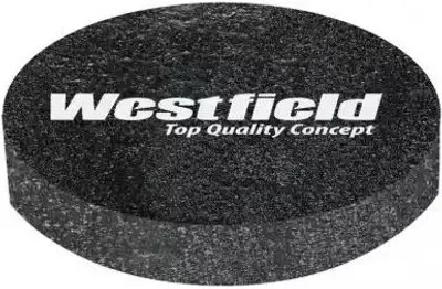 A black, circular object with white text on it.