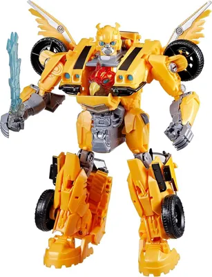A yellow robot toy with wings and a sword is standing against a white background.