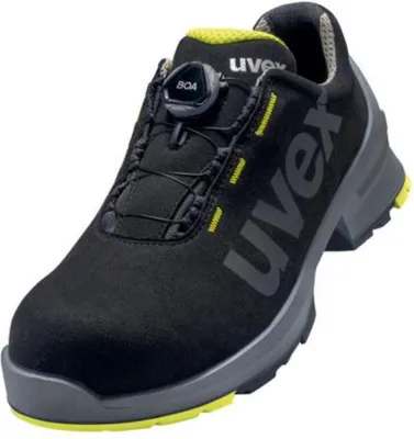 A black and yellow safety shoe with a BOA lacing system.