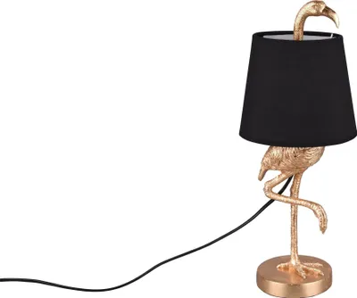 A gold flamingo-shaped table lamp with a black lampshade, shown against a white background.