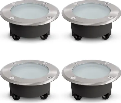 Four identical ground lights are arranged in a two-by-two grid against a white background.