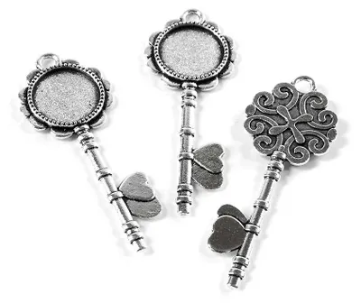 Produktbild von Vintageparts Fassung in Schlüsselform für 14 mm Cabochons Metall antik silberfarben 52 x 20 mm, 4 Stück