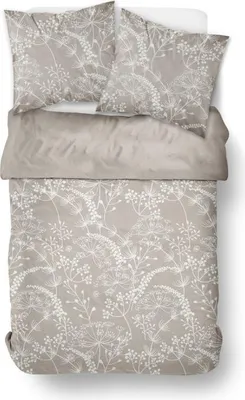 A top-down view of a bedding set laid out on a white surface.