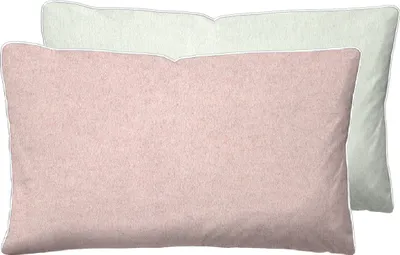 Two pillows are shown, one in front of the other. The front pillow is pink, and the back pillow is light green.