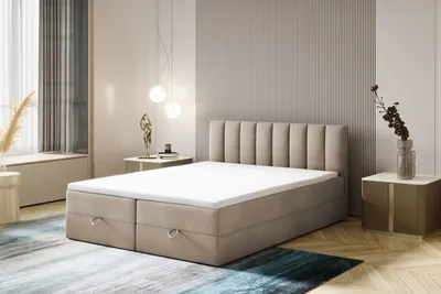 A bedroom scene with a bed as the main focus.