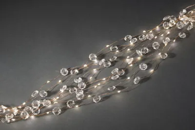 Produktbild von Konstsmide - LED Diamantenlametta 26 Stränge  à 27 Dioden , 702 warm weiße Dioden, 12V Innentrafo, kupferfarbener Draht; 6393-160