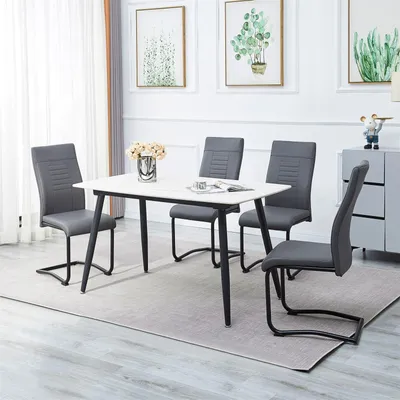 Produktbild von Esszimmerstuhl LOANO in grau 4er-Set, mit Schwinggestell aus Metall, Sitzschale gepolstert und mit Kunstleder bezogen, Schwingstuhl gepolstert