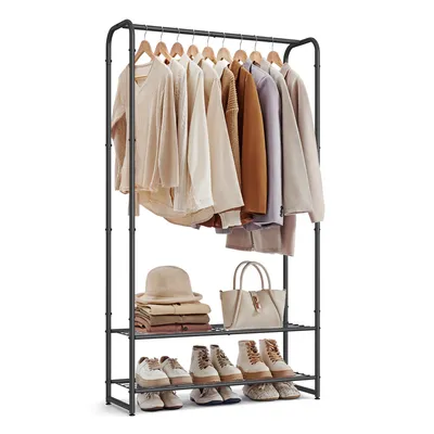 A black metal garment rack with shelves, filled with clothing, hats, bags, and shoes, displayed against a white background.