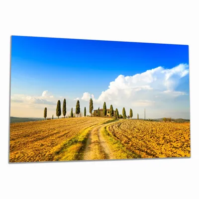 Produktbild von Wallario Herdabdeckplatte aus Glas, Größe 80 x 52 cm 1-teilig, Motiv Italien - Toskana unter blauem Himmel  einsame Farm