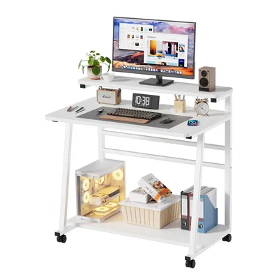 A white computer desk with a monitor, keyboard, and accessories on a white background.