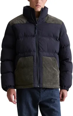 Zdjęcie produktu dla Kurtka męska marki Marc O'Polo, wykonana z denimu, pikowana, z kołnierzem typu stójka, wodoodporna