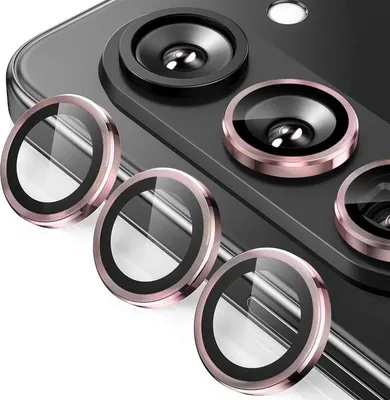 Close-up view of camera lens protectors for a smartphone.