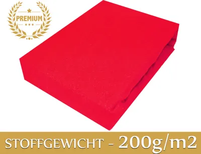 A red fitted sheet is folded and presented on a white background. A 'PREMIUM' badge is in the top left corner, and text indicating fabric weight is at the bottom.