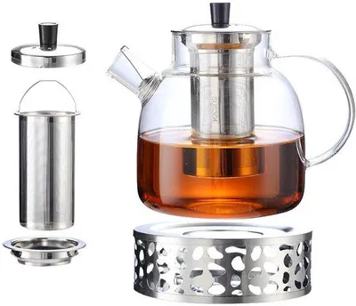 Produktbild von Unyqoos® Teekanne aus Borosilikatglas 1,5 L mit Edelstahl-Sieb & Stövchen, hitzebeständig -30 bis +150 °C, mikrowellen- und gasherdgeeignet