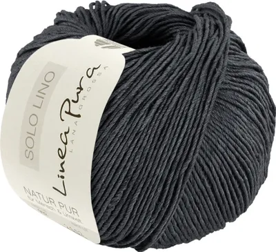 A ball of dark gray yarn with a label.