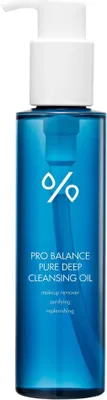 A product shot of a blue bottle of cleansing oil with a white pump dispenser.