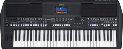 A top-down view of a black Yamaha PSR-SX 600 keyboard.