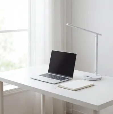 Produktbild von Flexo LED-Touch-Leuchte mit Helligkeits- und Farbtemperaturregler. Induktionsladegerät für Mobiltelefone. Weiß.
