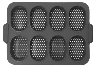 A top-down view of a dark gray silicone baking pan with eight oval-shaped molds, each with a perforated surface.