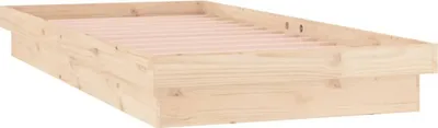 A wooden bed frame with slats.