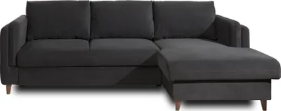 A dark gray sectional sofa is shown from the front against a white background.