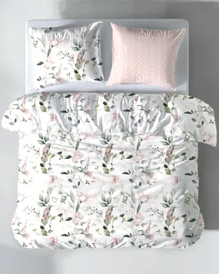 A top-down view of a bed with bedding and pillows.