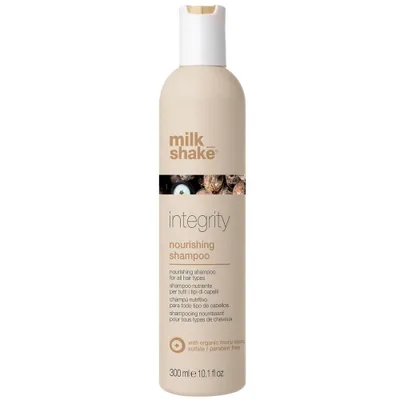 A product shot of a bottle of Milk_Shake Integrity Nourishing Shampoo against a white background.